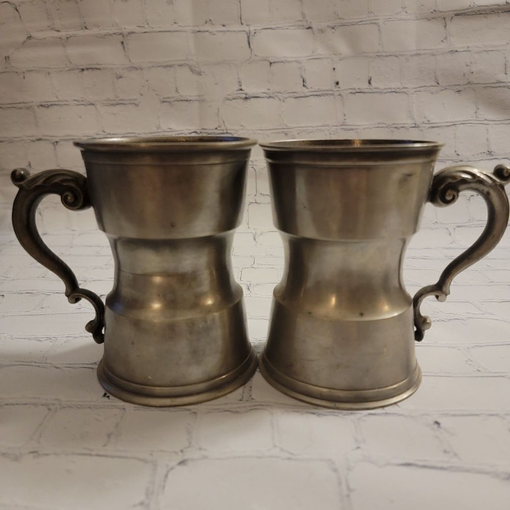 Antique  Pewter Tankard Set of T wo